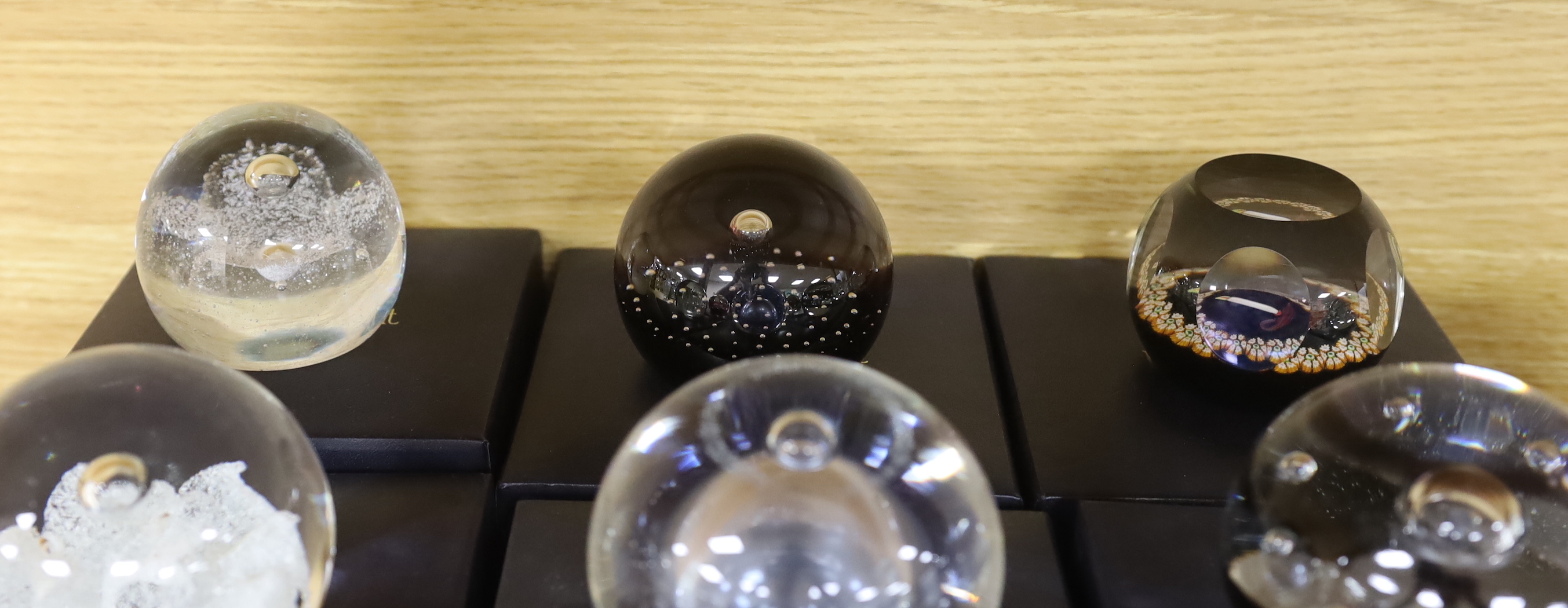 Ten Caithness paperweights, boxed, one limited edition